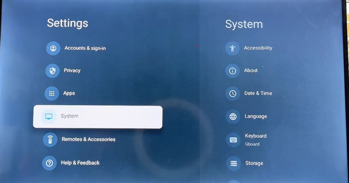tcl-tv-system-about-menu-bA TCL TV screen showing the System menu with the About option selected to find the build version for IPTV Smarters Pro.uild-setup